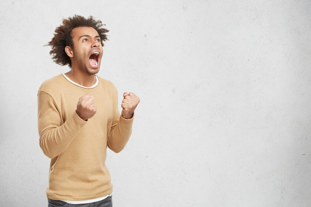 Excited man yelling because he's ready to buy a 3D printer